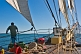Image of Lookout on watch in the bows of the sailing ship 'Picton Castle' as she cruises along the Massachusetts coast.