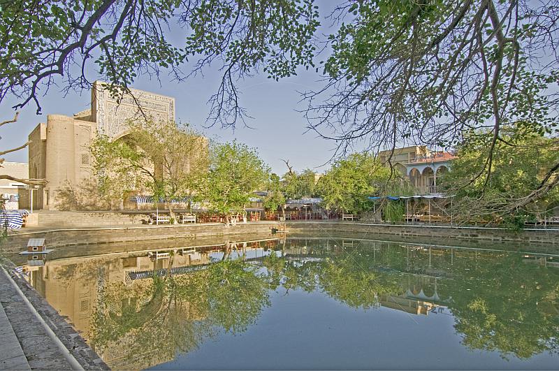 Reflection of the Nadir Divanbegi Khanaka in the Lyabi Hauz pool.