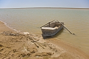 A lone rowing boat awaits the fisherman on the Amudar Ja River, formerly famous as the mighty Oxus River.