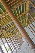 Carved pillars and painted wooden ceiling in the Juma Mosque (Friday Mosque).