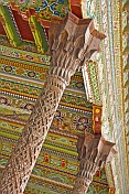 Intricately carved pillars and painted wooden ceiling in the Juma Mosque (Friday Mosque).