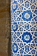 Image of Detail of ornate blue glazed ceramic tilework on the Amin Khan Madrassah.