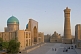 Image of The last of the evening shunshine lights the Mir-I-Arab Medressa and the Kalon Minaret.