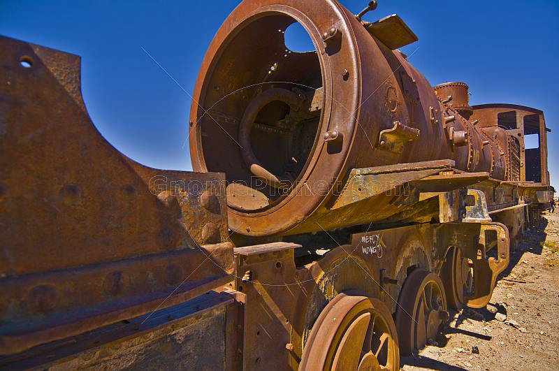 Rusting steam locomotives in the cemetery of steam engines.