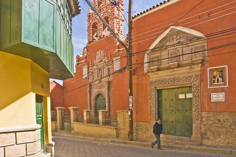 Man walks past the Museo and Convento de Santa Teresa.