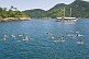 People swiming in the waters of the Bahia Da Ilha Grande.
