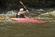 Image of Canoeist in red Dagger kayak negotiates rapids.