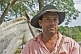 Image of Brazillian cowboy with white horse.