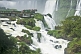 Image of Travellers admire the waterfalls at the Iguazu Falls.