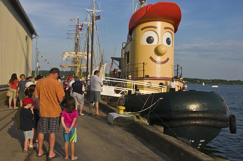 Visitors to Pictou Docks wait to board for a harbour trip on the tugboat 'Theodore Too'.