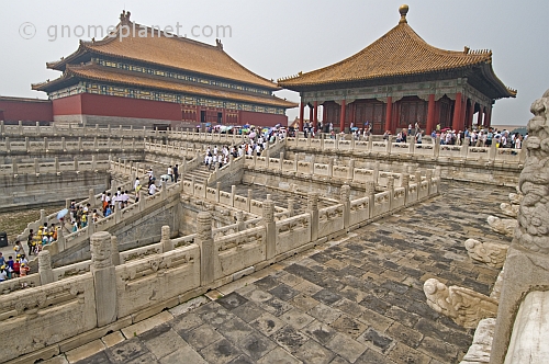 Chinese tourists climb the stairs to the Hall of Preserving Harmony at the Forbidden City.