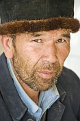 Local Kashgar man with traditional felt fur-rimmed hat known in Uighur as a doppa.