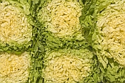 Green and yellow leaves of Chinese lettuce.