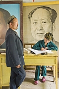 Silk workers with Chairman Mao Tsedong picture.