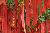 Red and gold Good-Luck banners at the Great Buddha Temple.