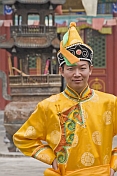 Boy in traditional dress at the Dazhao Buddhist Lamasery.