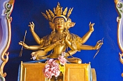 Three-headed God statue at the Dazhao Lamasery.