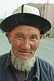 Image of Elderly Uighur man with hat and beard.