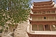 Image of Chinese-style multi-layered roofs protect access to the Buddhist Mogao Caves.