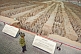 Image of Chinese guard watches over the Terracotta warriors in pit number 1.