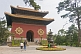 Incense burner and gateway to Putuozongcheng Buddhist Temple.