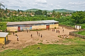 Small boys play football in the playground of the Mission Evangelique School.