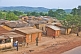 Image of A small village of mud-brick houses next to the main road to Matadi.