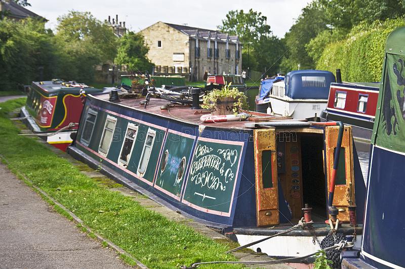 Moored narrow boats on the Leeds Liverpool canal near Belmont Street.