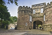 Gatehouse and entrance to Skipton Castle - a well preserved medieval castle first built in 1090.