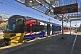 Image of Train to Bradford waits on platform at Ilkley Railway Station.